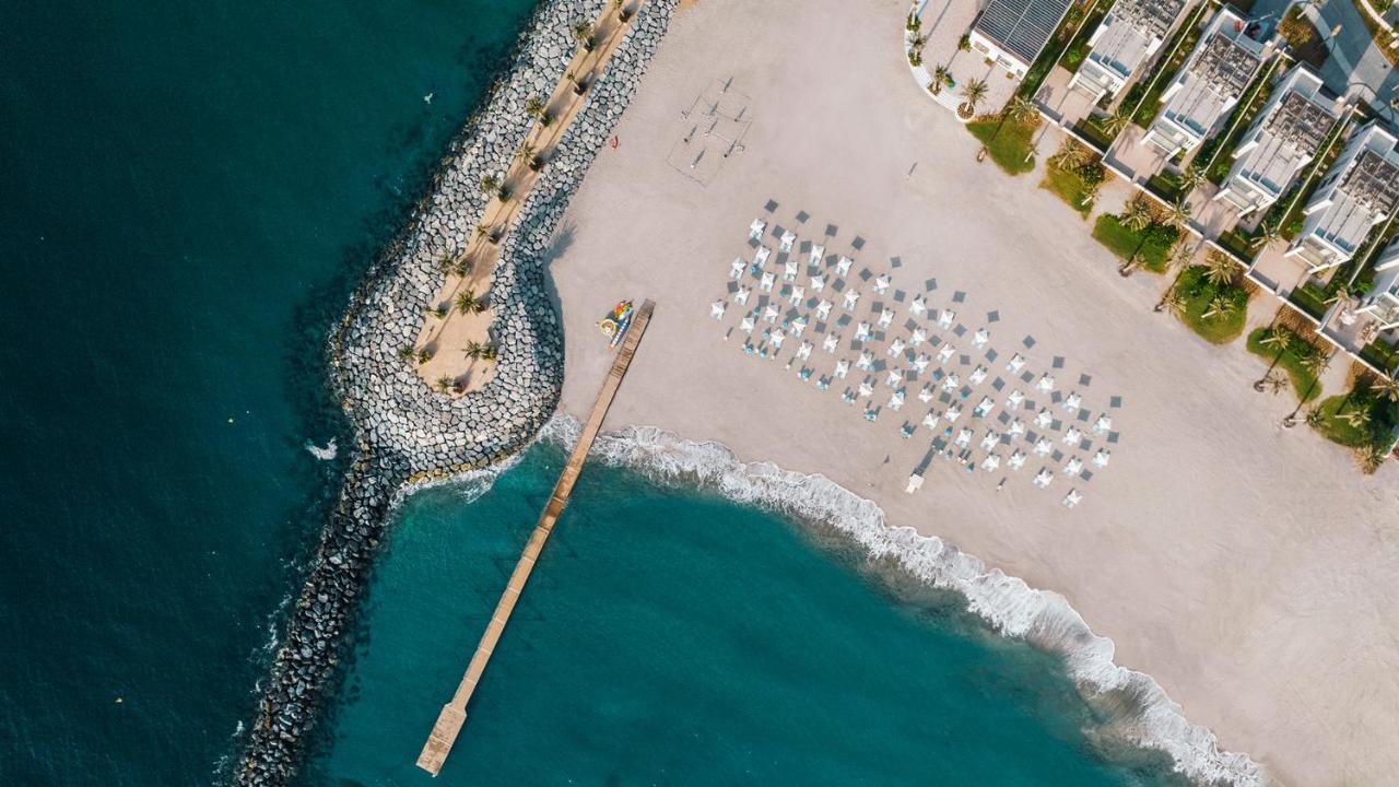 Address Beach Resort Fujairah Al Aqah Extérieur photo Aerial view of the beach